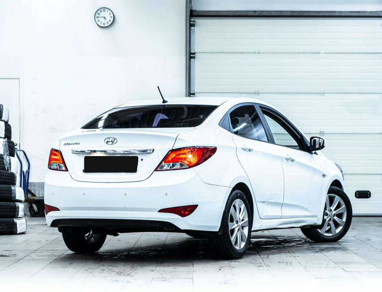 Купить Hyundai Solaris с пробегом. Фото: #2