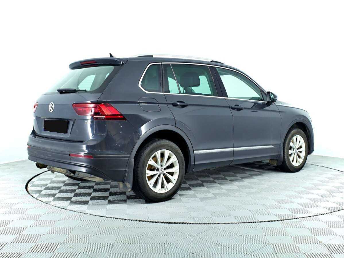 Купить Volkswagen Tiguan с пробегом. Фото: #4