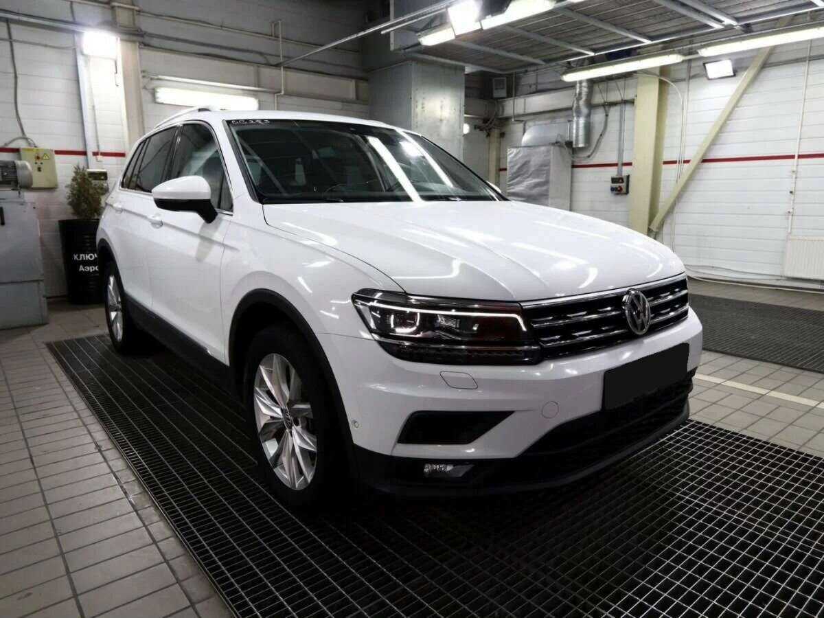 Купить Volkswagen Tiguan с пробегом. Фото: #2