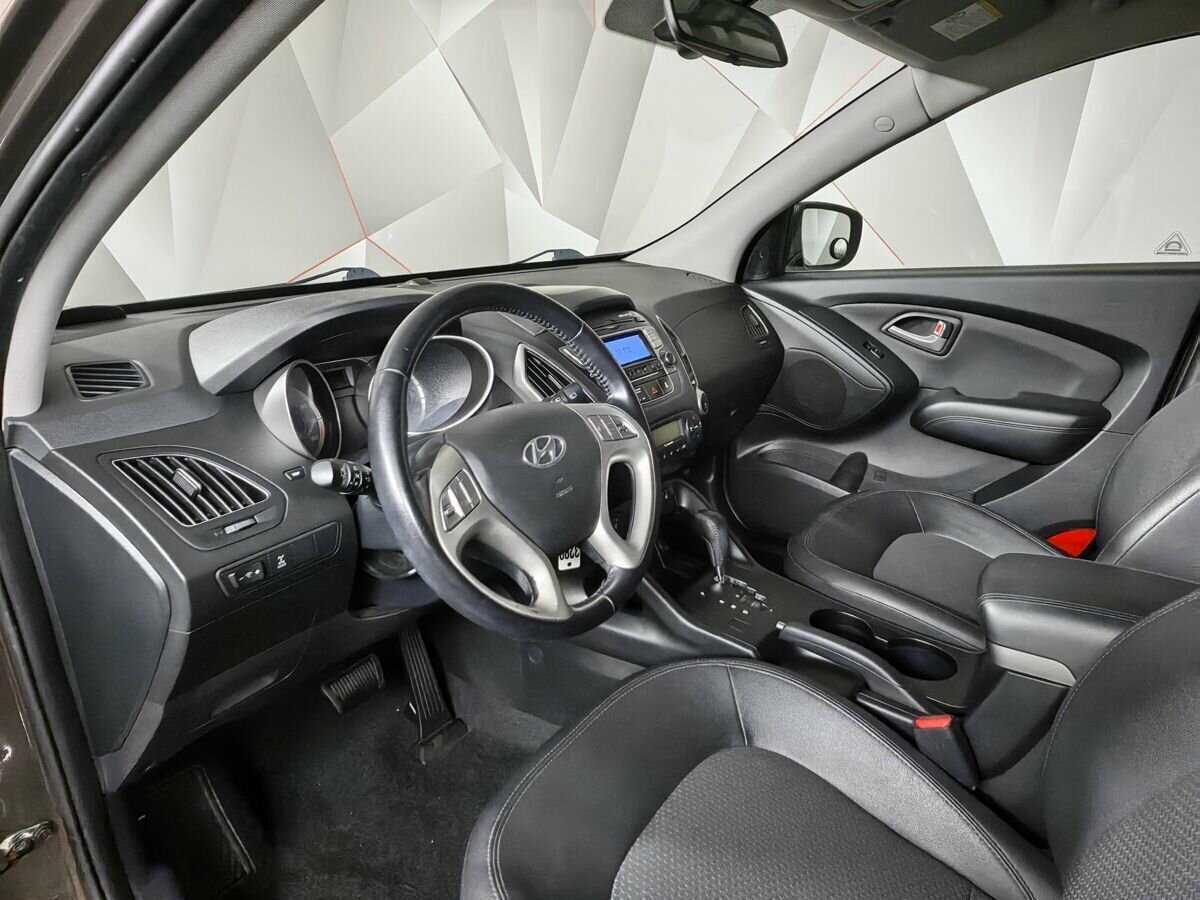 Купить Hyundai ix35 с пробегом. Фото: #11